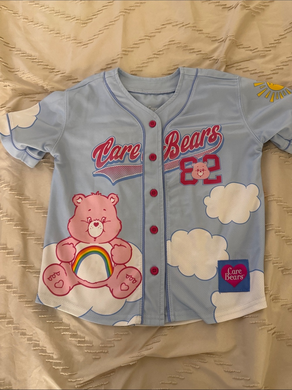 Girls’ Care Bears Light Blue Baseball Jersey with Pink Bear and Rainbow